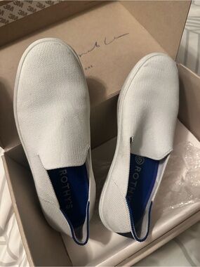Rothy's White Slip-On Flats with Blue Inner Trim